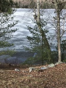 melting shoreline at pond in western Maine